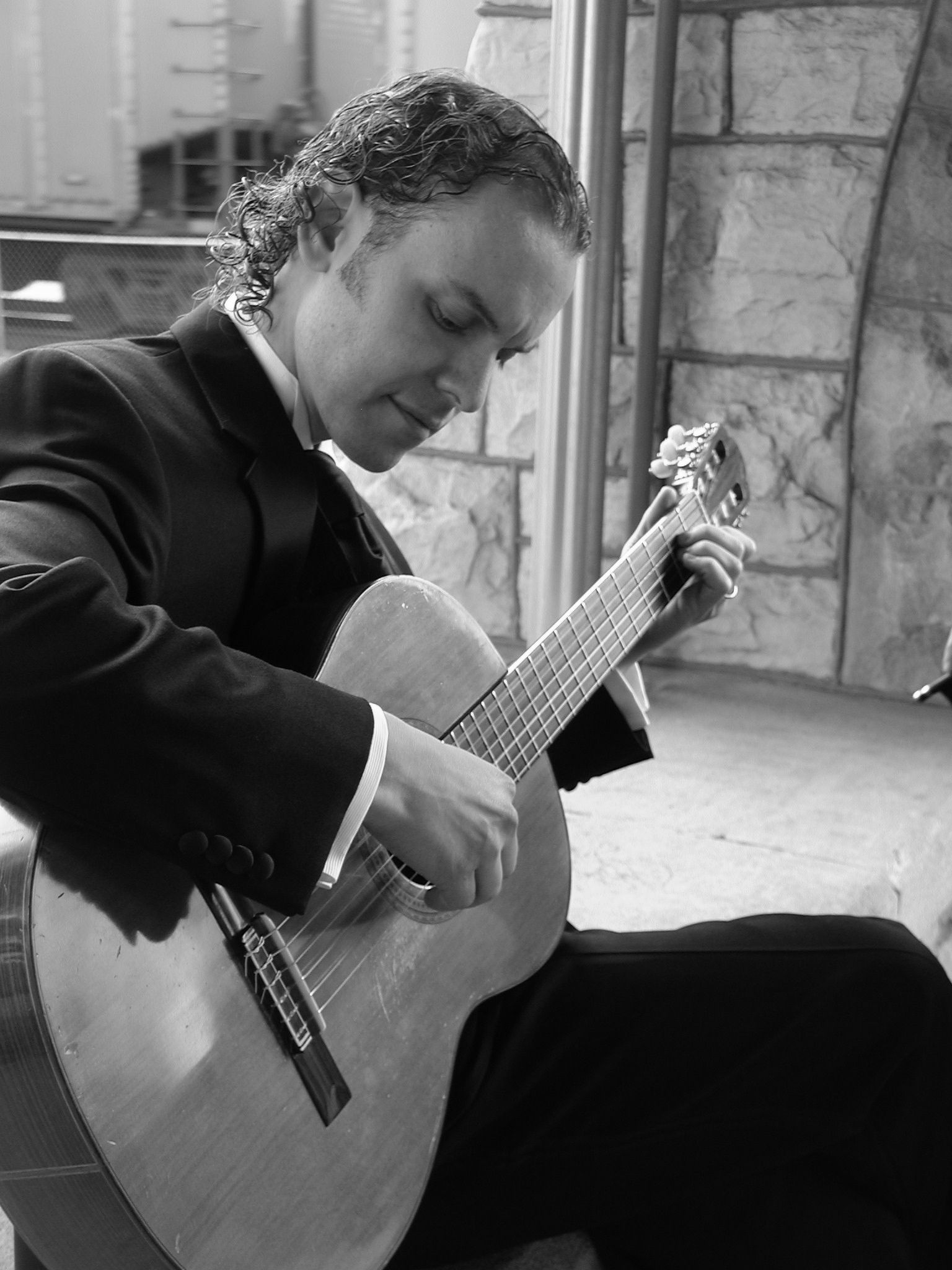 Jason playing classical guitar