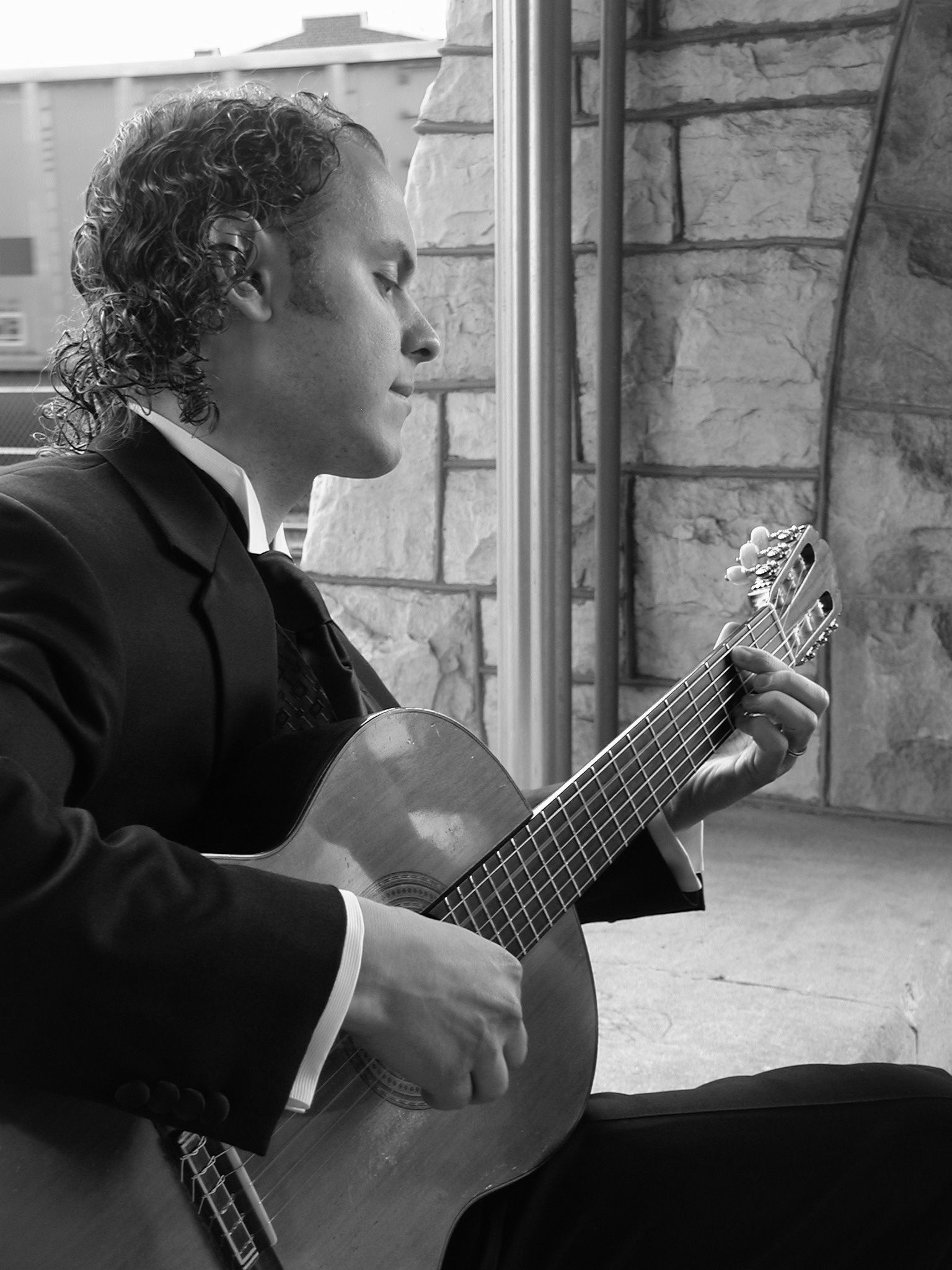 Jason Deroche playing guitar
